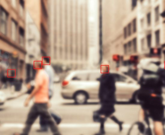 Face recognition signs and tags on people faces. Privacy and personal data protection. Blurred picture with drawn symbols.